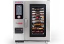 Hobart Chef’sCombi 10 x 1/1 GN combi oven loaded with ten trays of pastries, pizza, steaks, roast vegetables, fries and fish