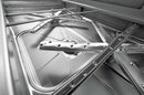 Inside the Hobart Profi UXT showing the stainless steel ROTOR-X wash arms and fine filter
